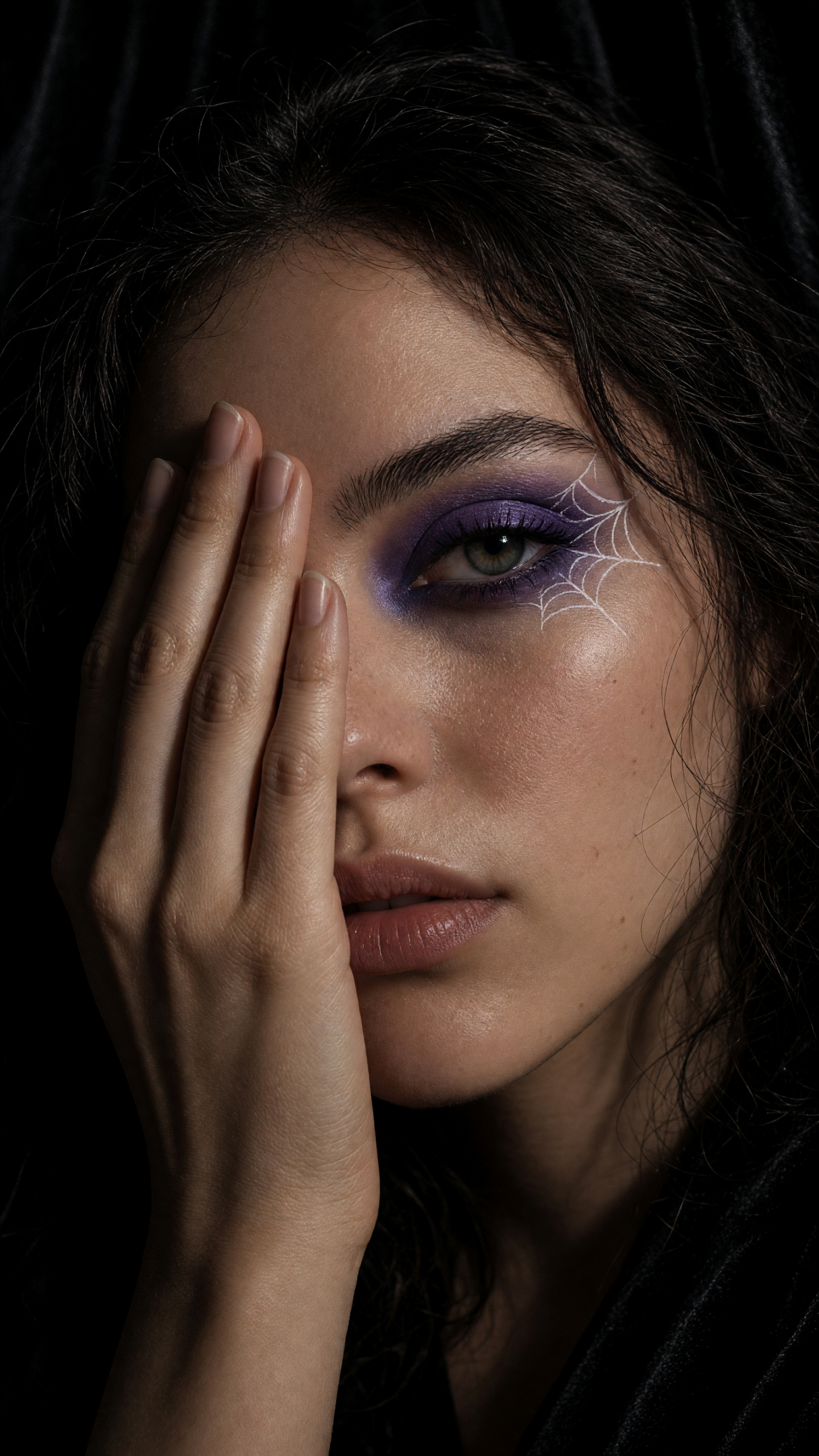 Makeup transition with violet smoky spiderweb eyeliner